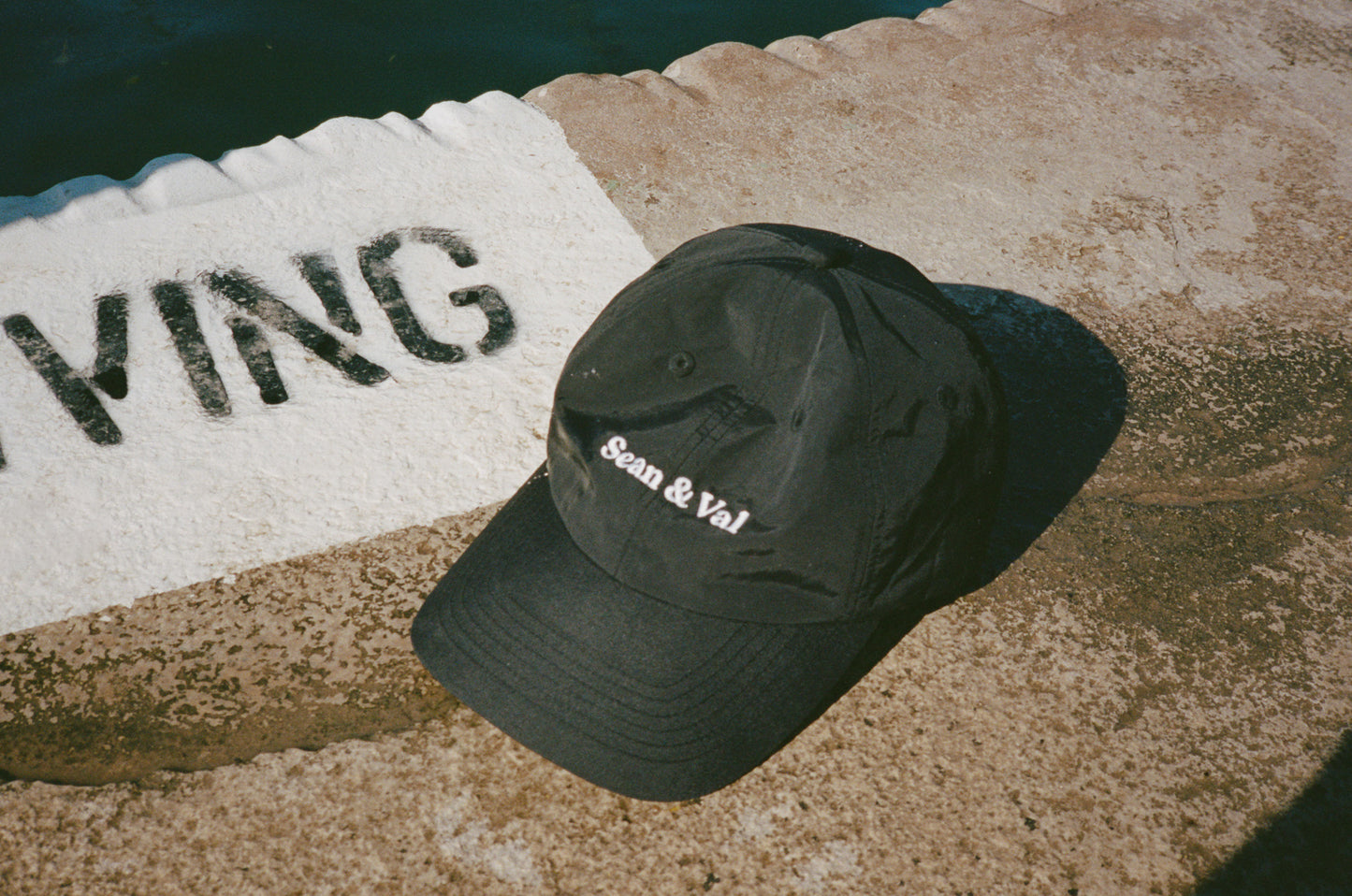 photo of hat on cement