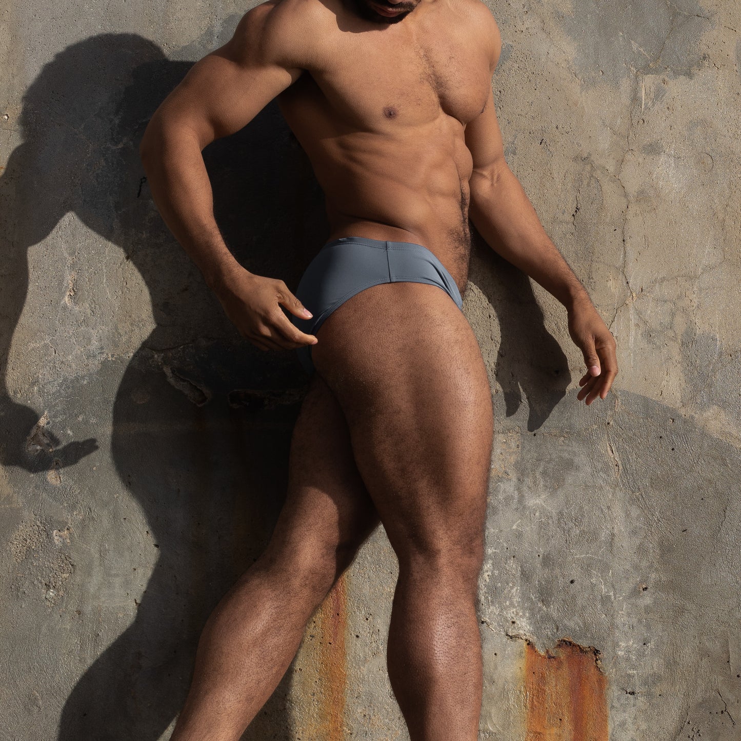 Blue swim brief on model