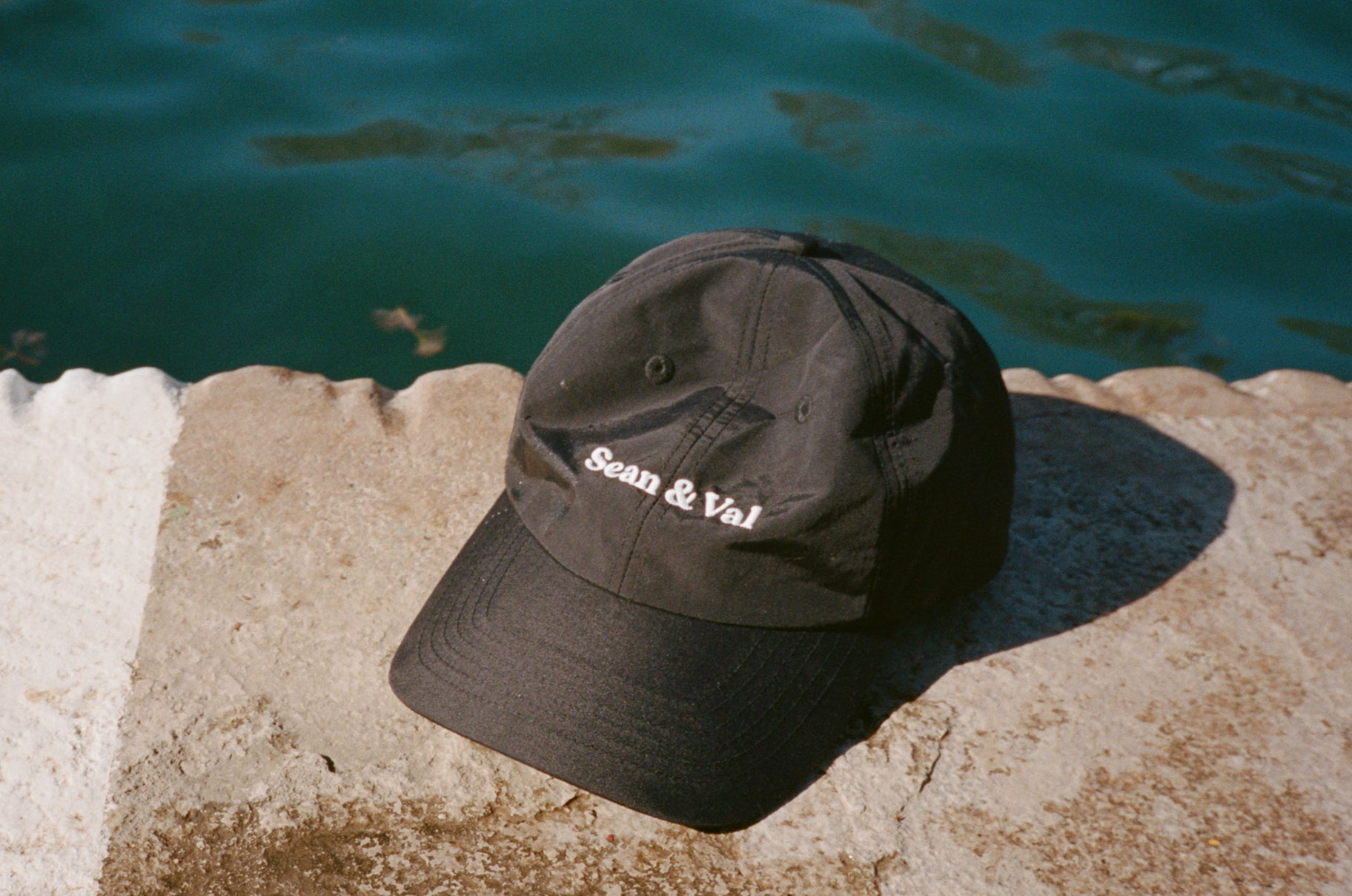 photo of hat on cement