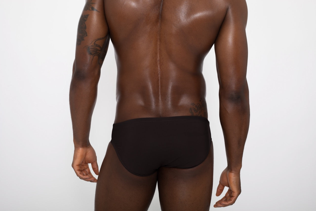 Model in specified swim brief color