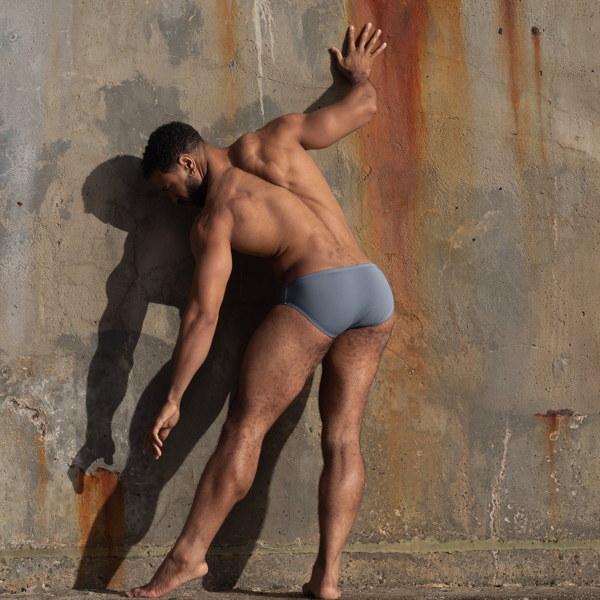 Blue swim brief on model